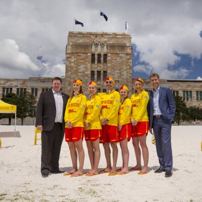 CEO of SLSQ John Brennan and UQ Vice-Chancellor Professor Peter Høj with SLSQ volunteers